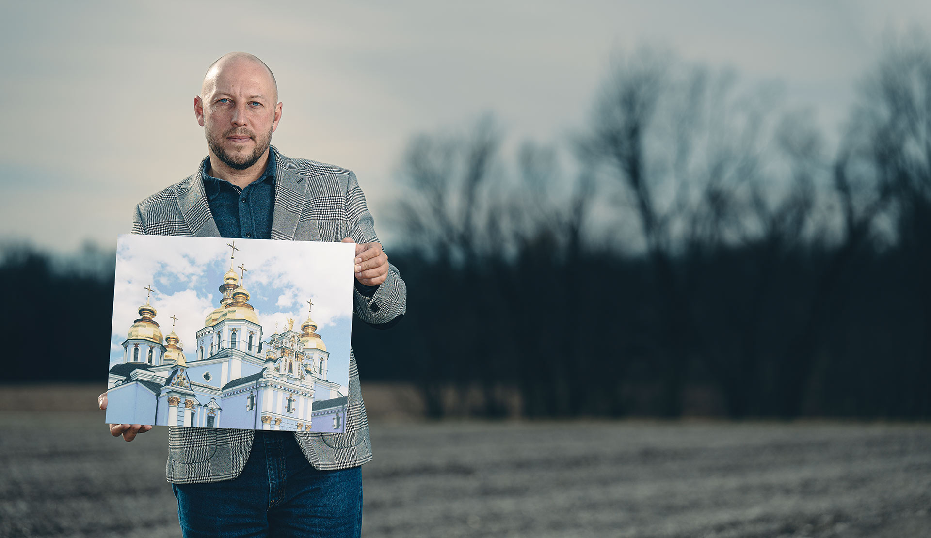 Ruslan Buriak holding photo