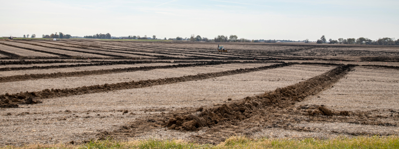 agriculture field being tiled for drainage