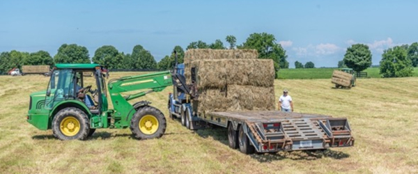 loading hay bales