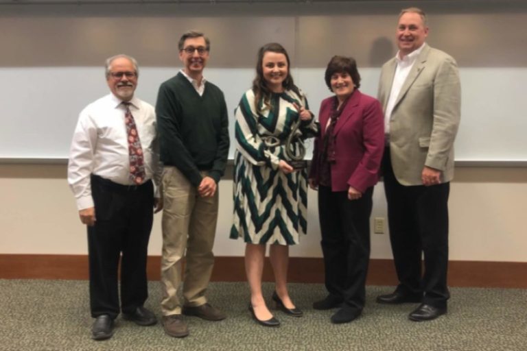 Spirit of the LandGrant Mission Award presented to Haley Oliver Feed