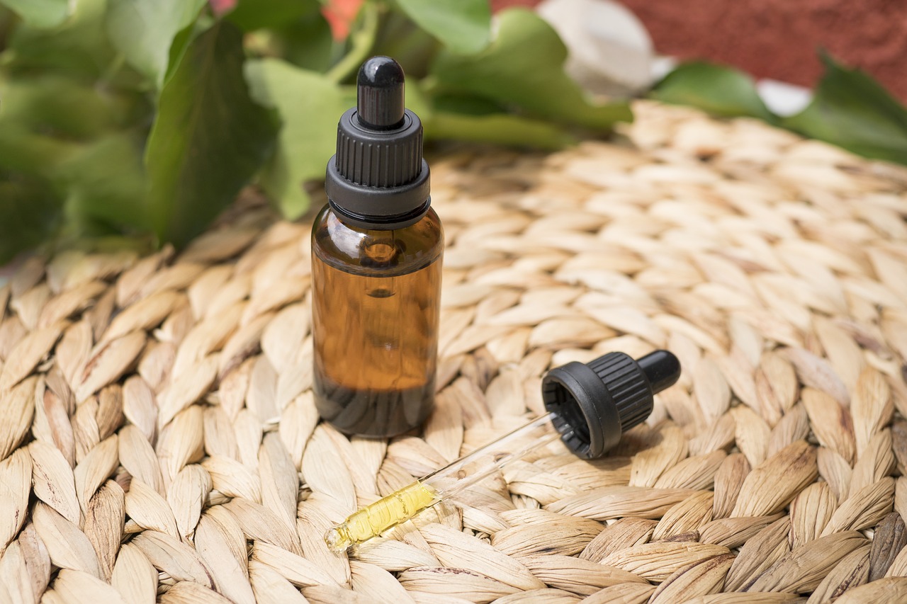 cbd oil container and a medicine dropper
