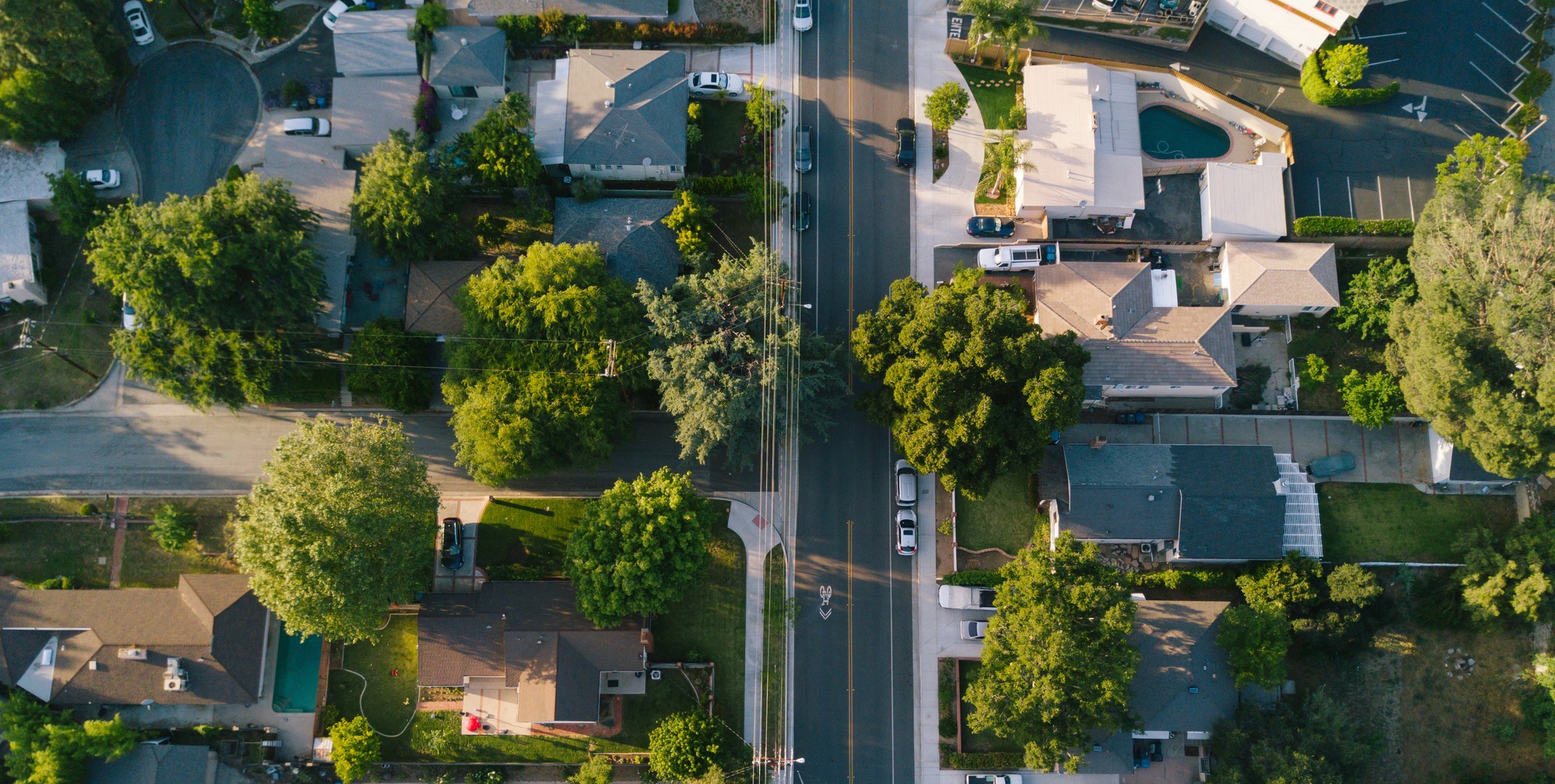 Wide banner showing an aerial view of a Midwestern city