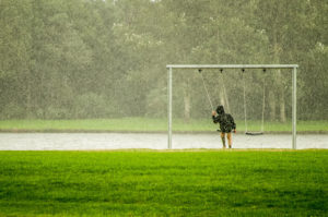 person on a park swing