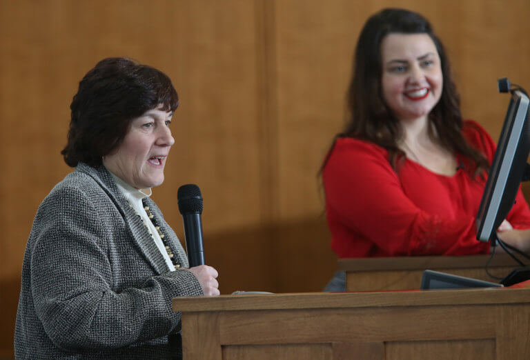 Two woman on a podium