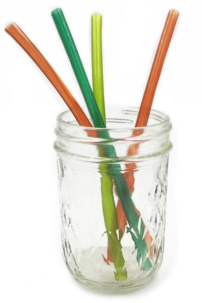 colorful straws on a glass
