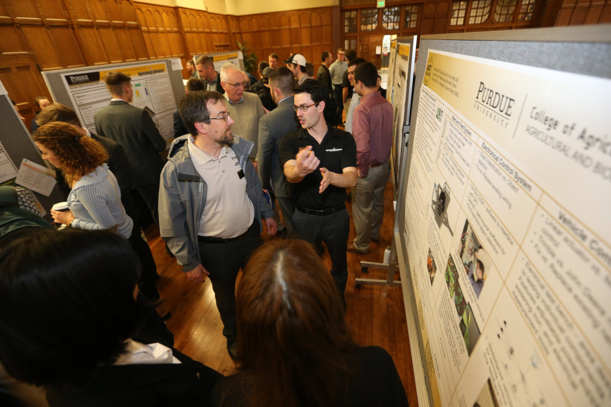 student in a poster presentation