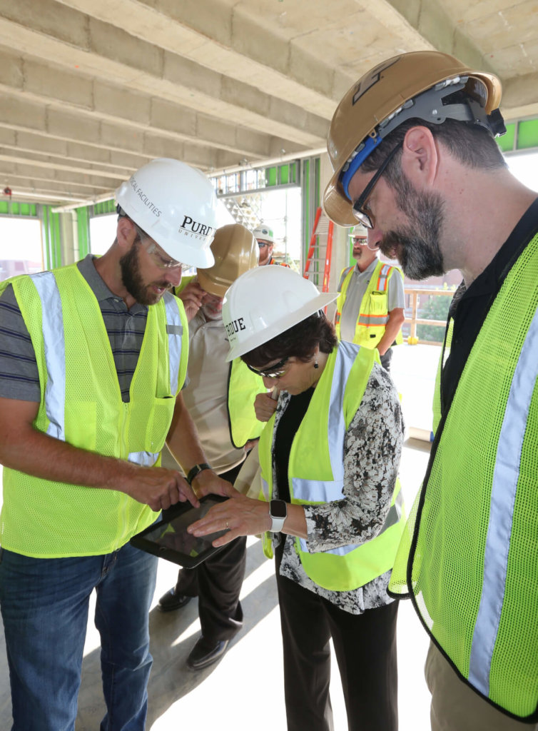 adults working with tablet