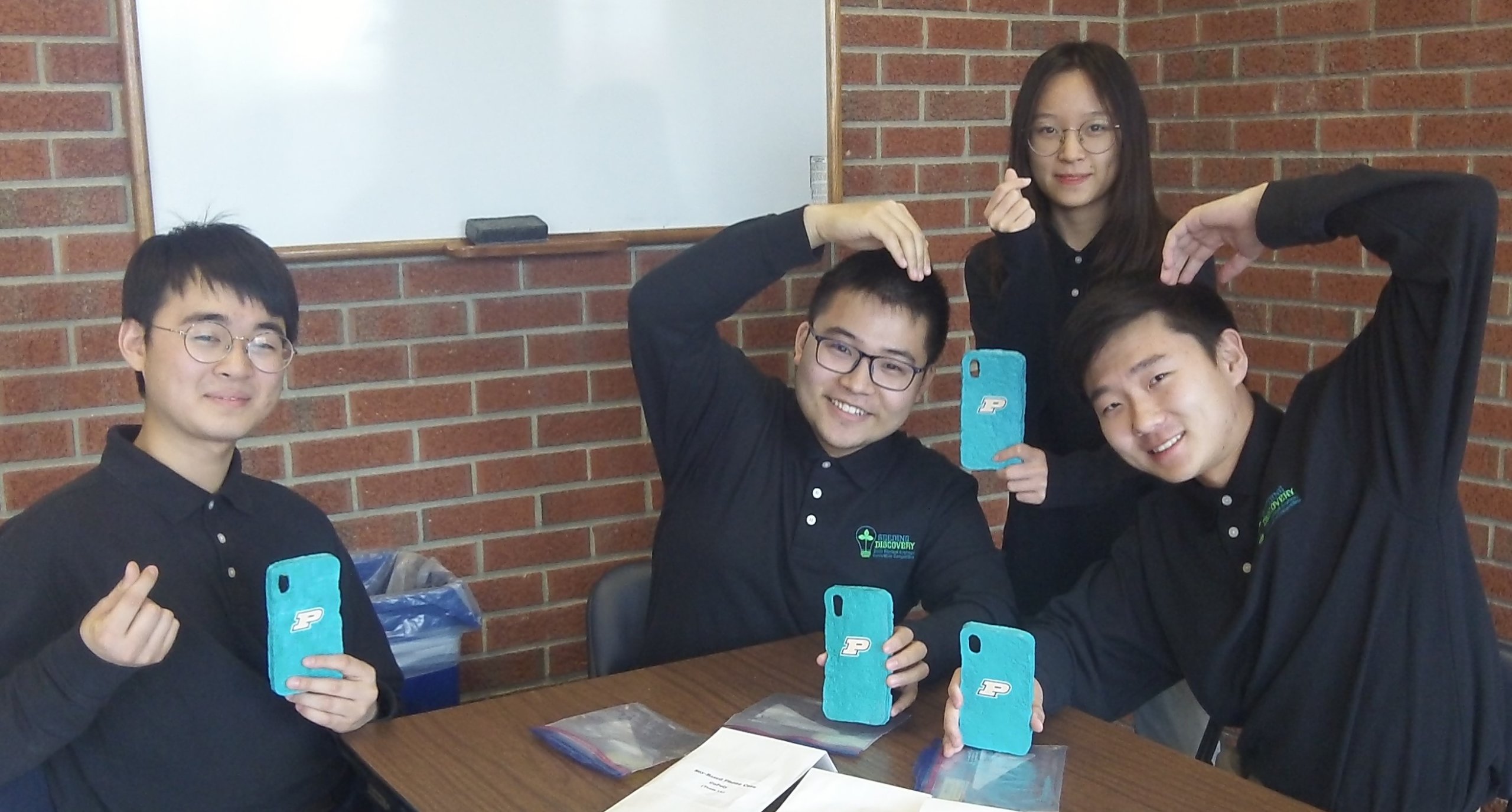 Zifeng Huang, Jingyuan Li, Shuyi Peng and Kunming Shao of Team GoPoly created a soy-based smart phone case that is waterproof and scratch resistant. (Photo by Michelle Creech)