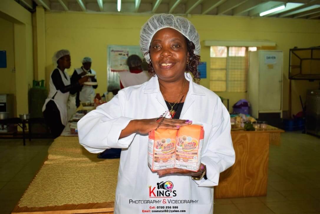 Professor Violet Mugalavai of the University of Eldoret with an Instant Ugali package in the Food Processing Training and Incubation Center. (Photo provided by Violet Mugalavai)