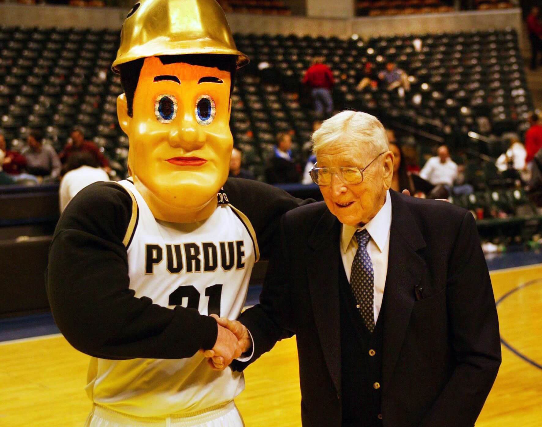 Charlie Nichols was thrilled to get to pose for a photo with legendary coach John Wooden in Indianapolis in 2002. (Photo Provided)