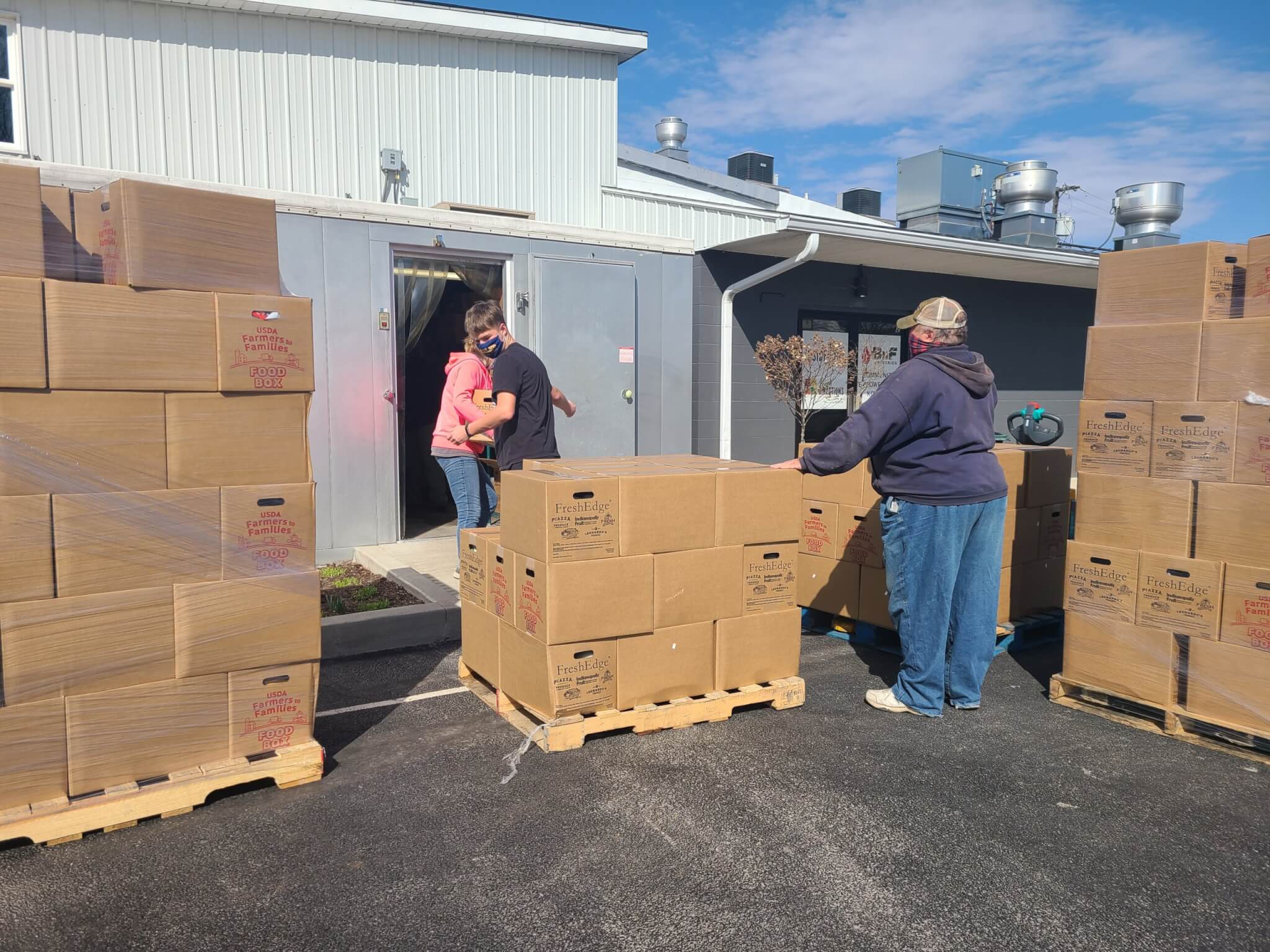 boxes of food stack ready for delivering