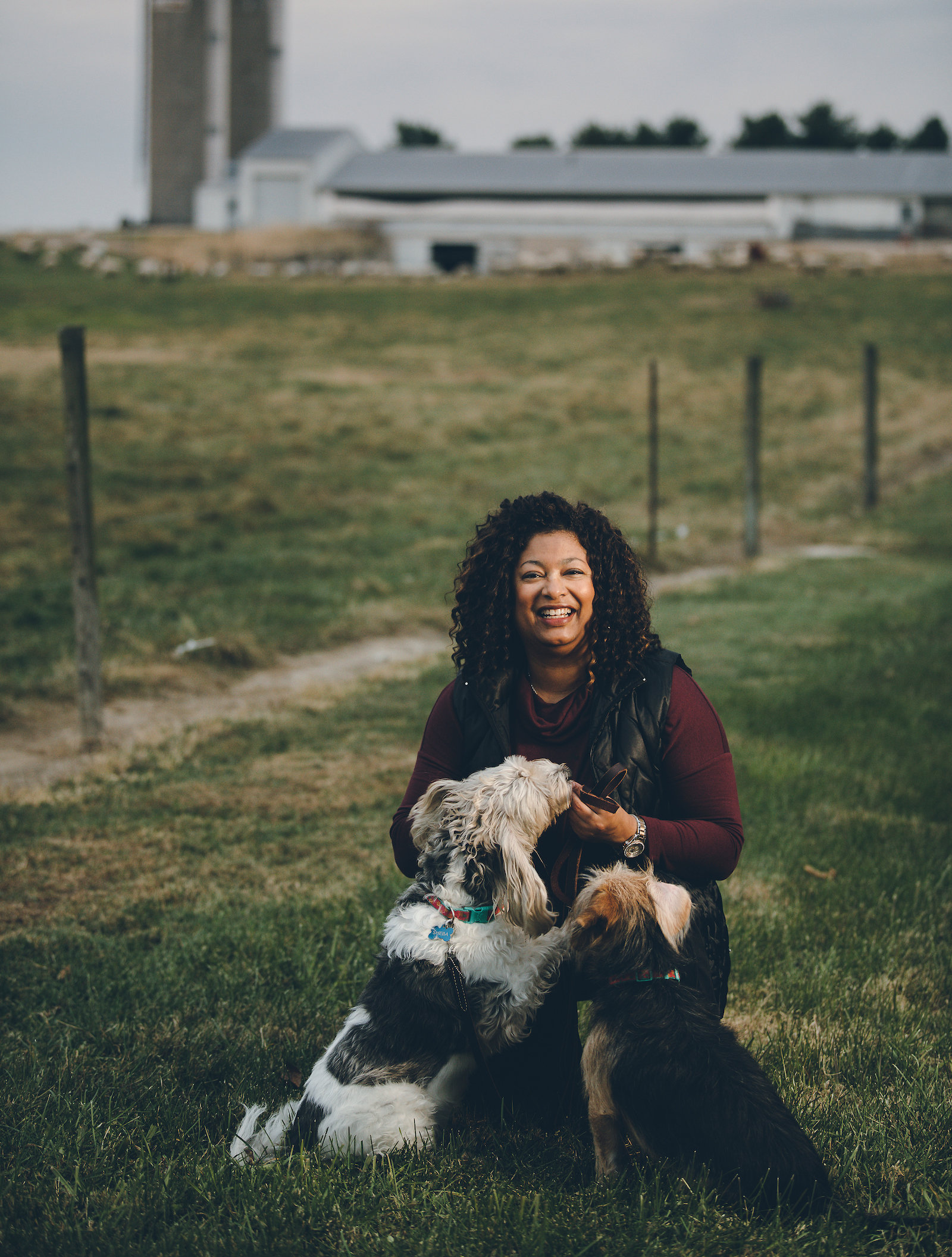 Candace with her dogs outdoors