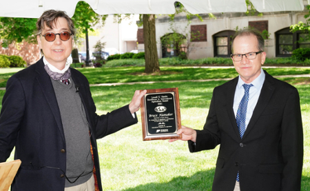 Gerald Shively, associate dean, presents the award