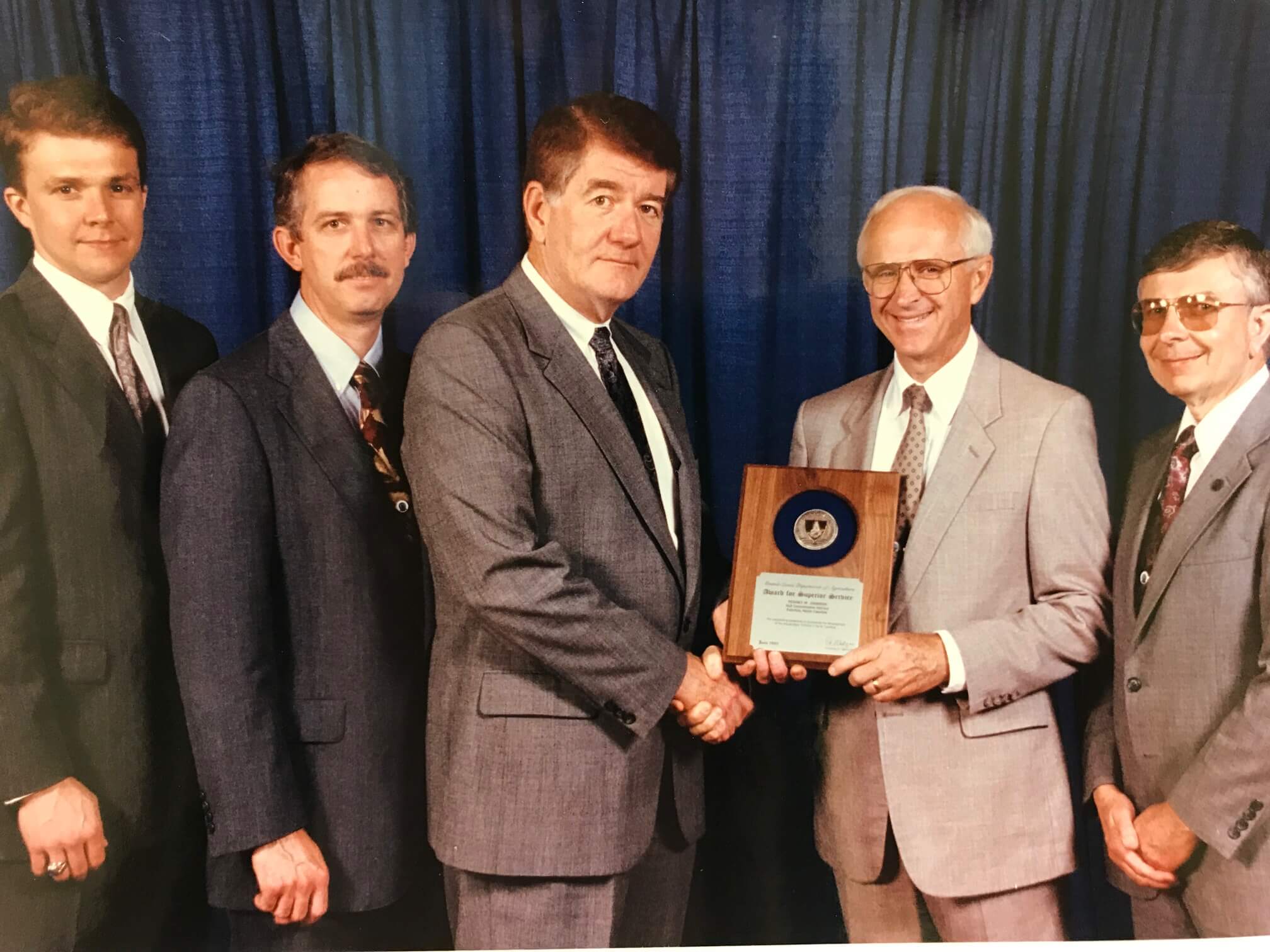 (From left to right, Jay Akridge, Terry Stewart, Secretary of Agriculture Edward Madigan, Max Judge and John Forrest in Washington D.C. 1992)