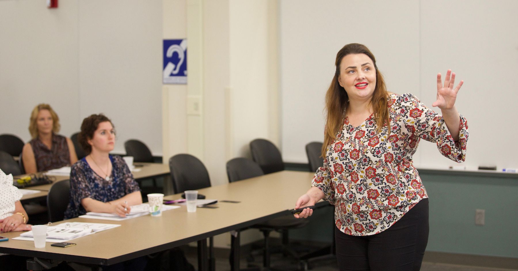 Professor Haley Oliver teaching in classroom 