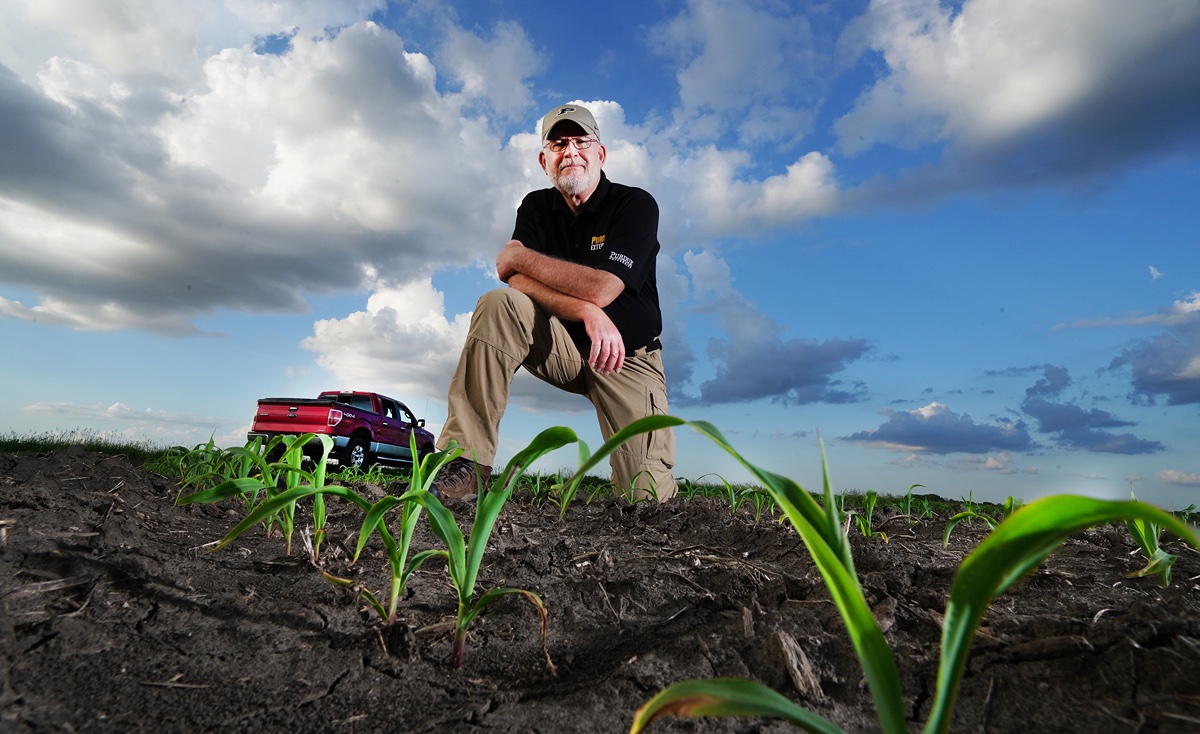 Bob Nielsen in freshly planted field 