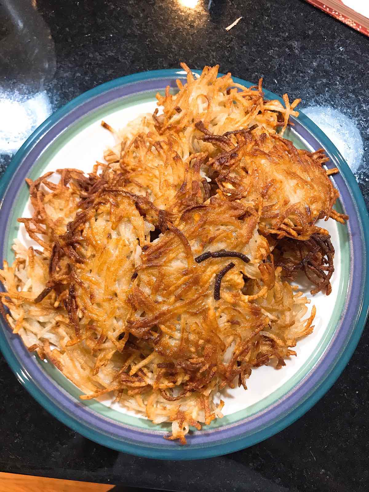 Latkes fresh from the griddle
