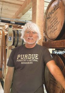 Wally Dant in the Log Still rickhouse.