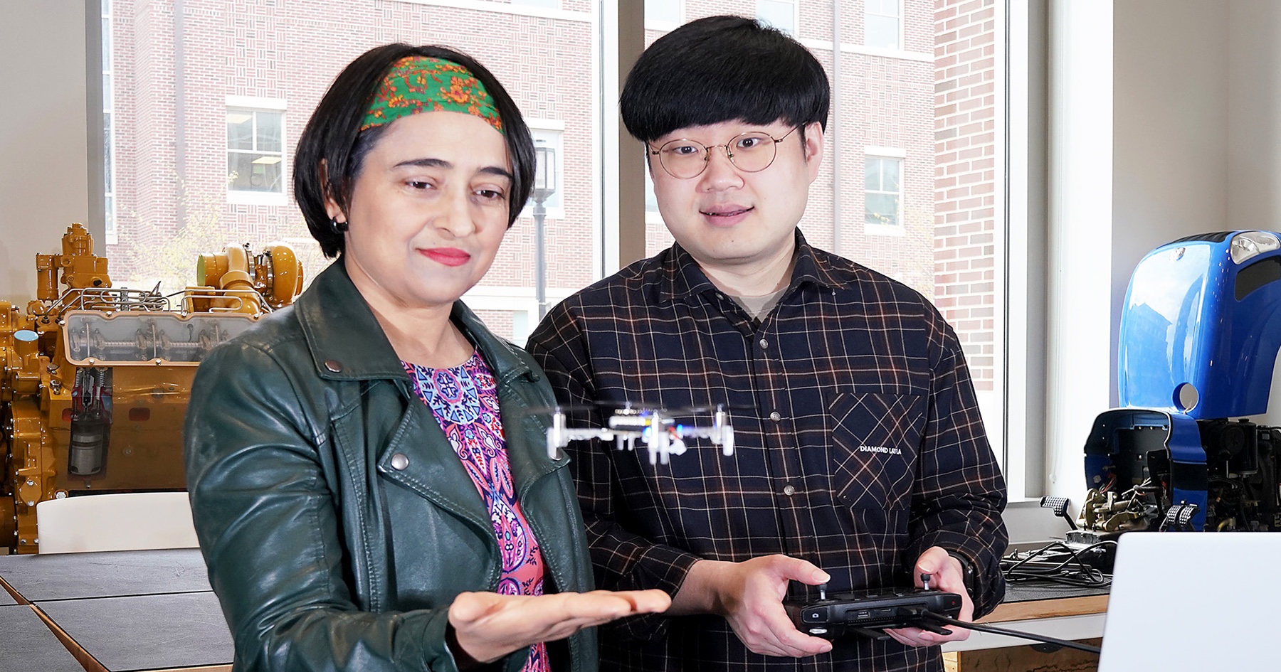 ABE Professor and grad student fly a drone