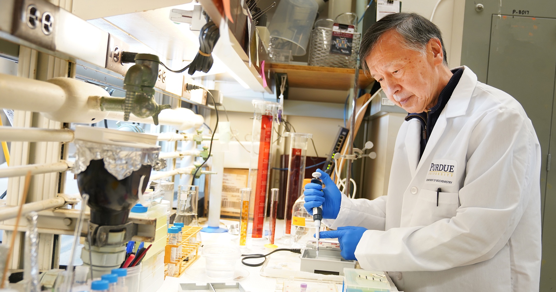 Kwok Ki Ho works in biochemistry lab. 