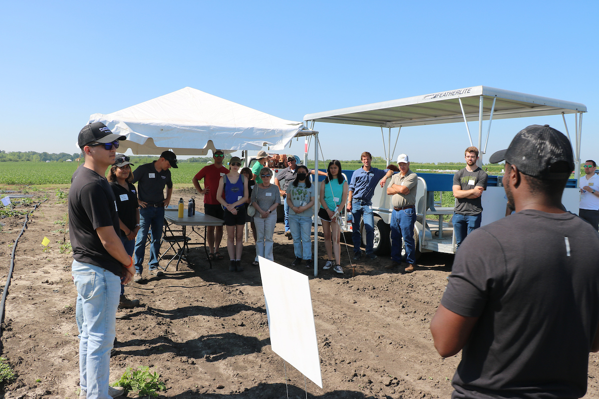 Purdue Field Day participants listen and learn from Purdue Botany and Plant Pathology experts.