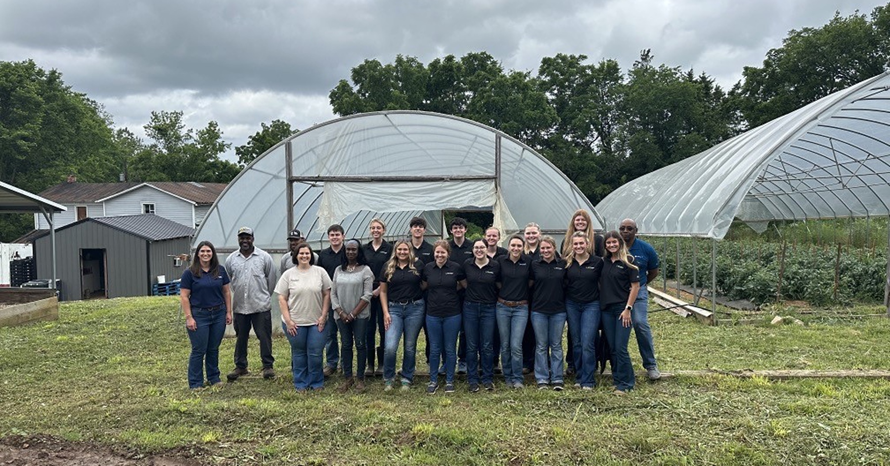 Lusk and Farm Credit Mid-America’s interns on a trip to a customer’s farm