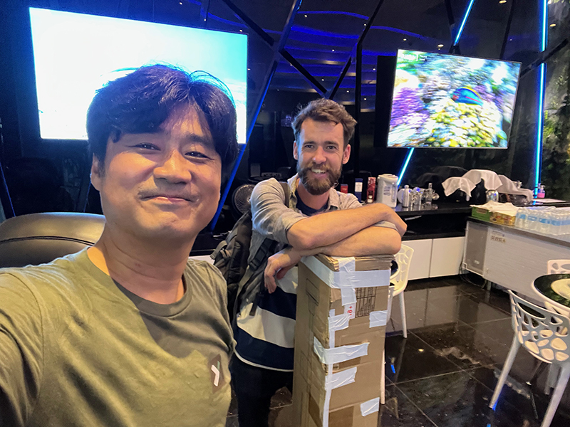 Purdue University’s Jinha Jung (left), associate professor in the Lyles School of Civil Engineering, and PhD student Joshua Carpenter traveled to Singapore last spring to compete in the XPRIZE Rainforest semifinal competition. (Photo provided by Jinha Jung, Purdue University