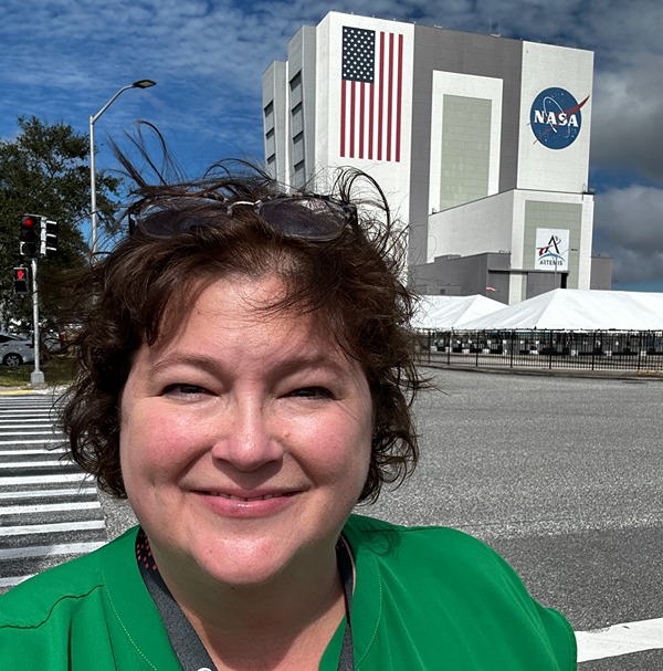 Caldwell in front of the Kennedy Space Center.jpg