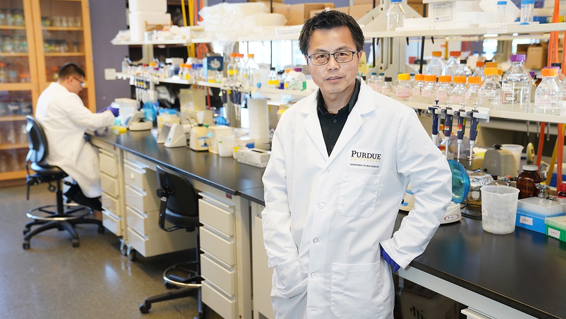 W. Andy Tao standing in biochemistry lab