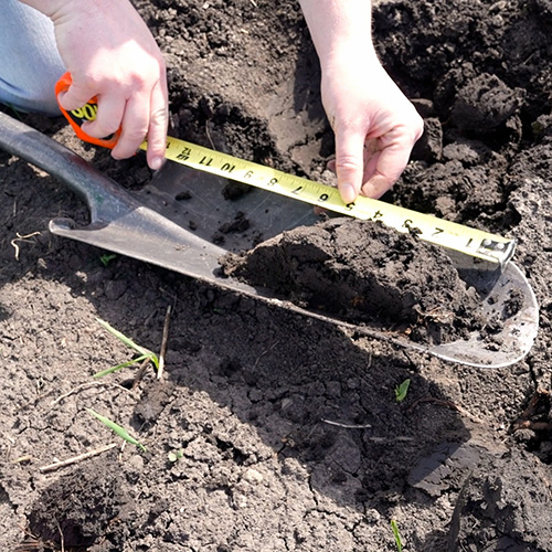 Measuring soil in a field