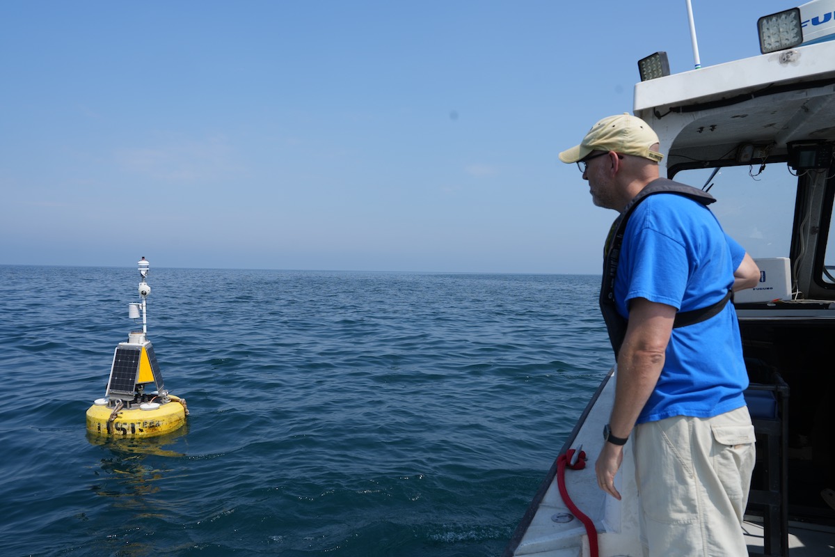 Höök inspects buoy