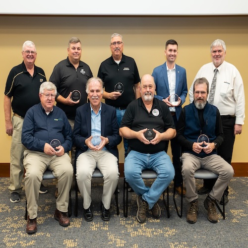 The Gearing Up for Safety: Production Agricultural Safety Training for Youth team holding the Purdue Agriculture TEAM Award.