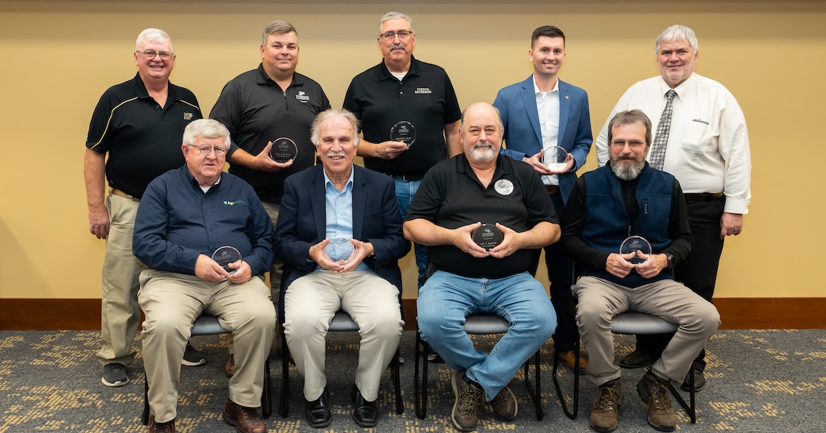 The Gearing Up for Safety: Production Agricultural Safety Training for Youth team holding the Purdue Agriculture TEAM Award.