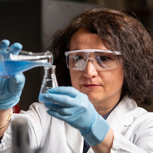 Senay Simsek holding beakers