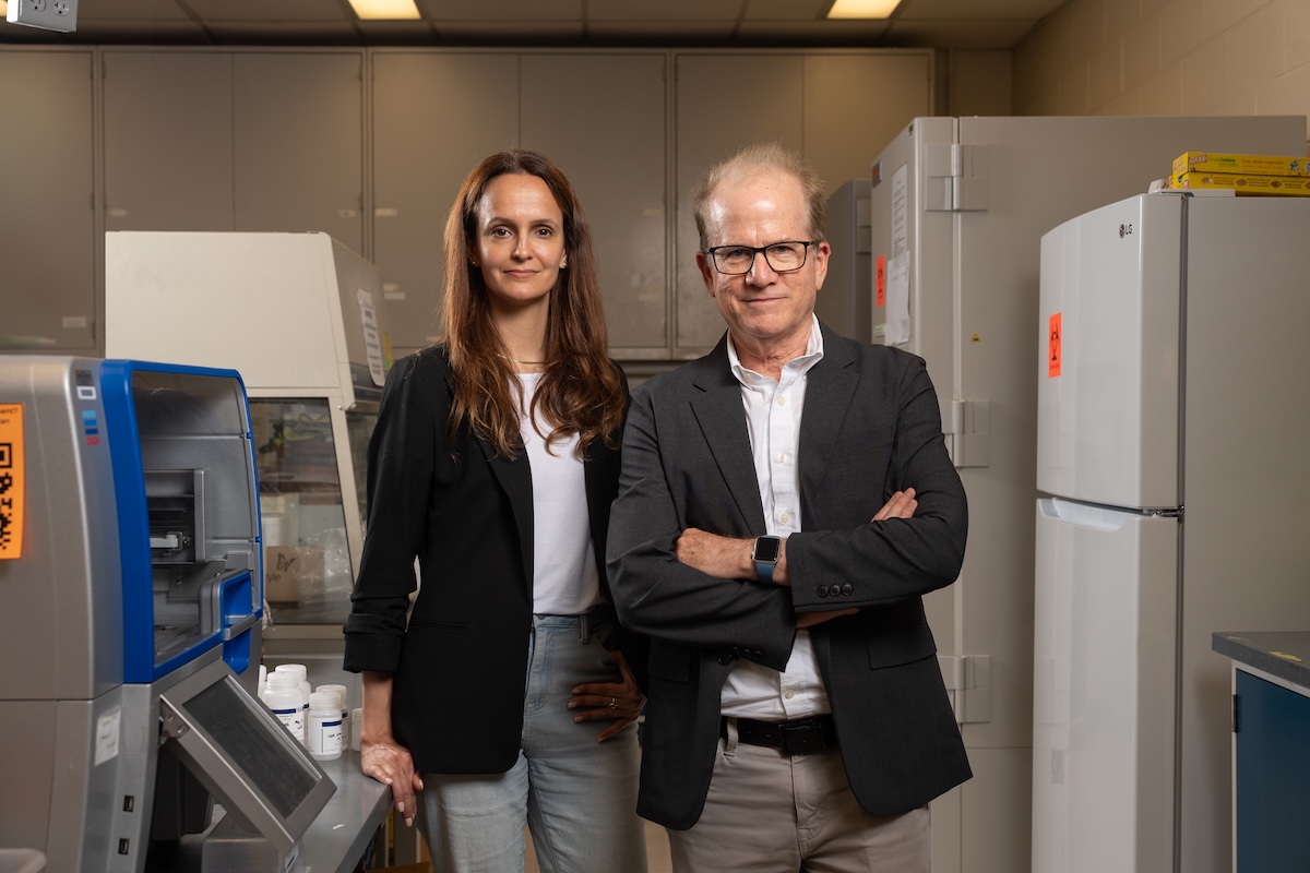 Thaisa Cantu-Jungles and Bruce Hamaker stand in a food science lab