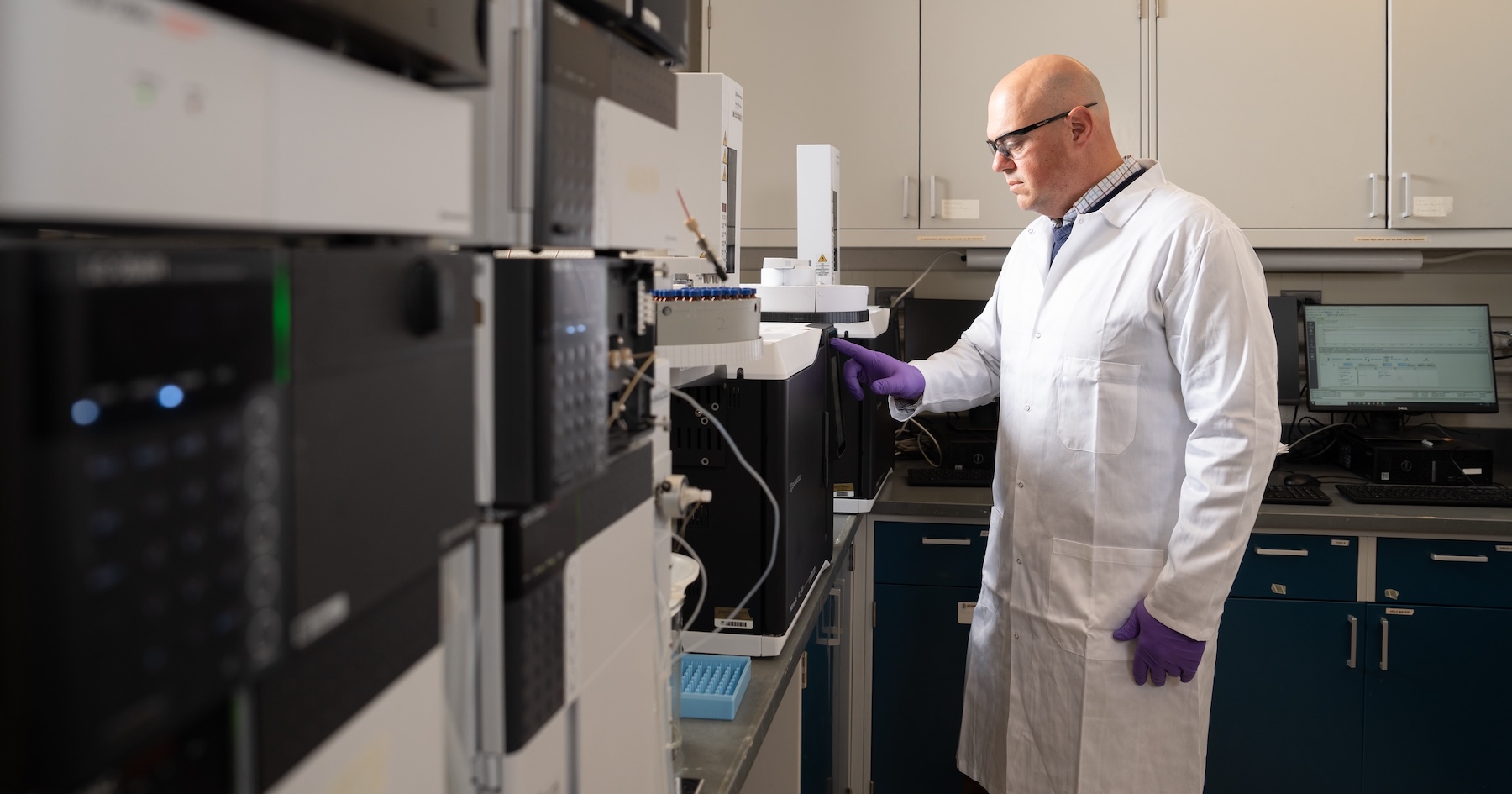 Steve Lindemann wearing lab coat in a lab