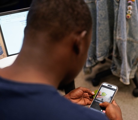agbridge participant looks scans a leaf through their phone camera