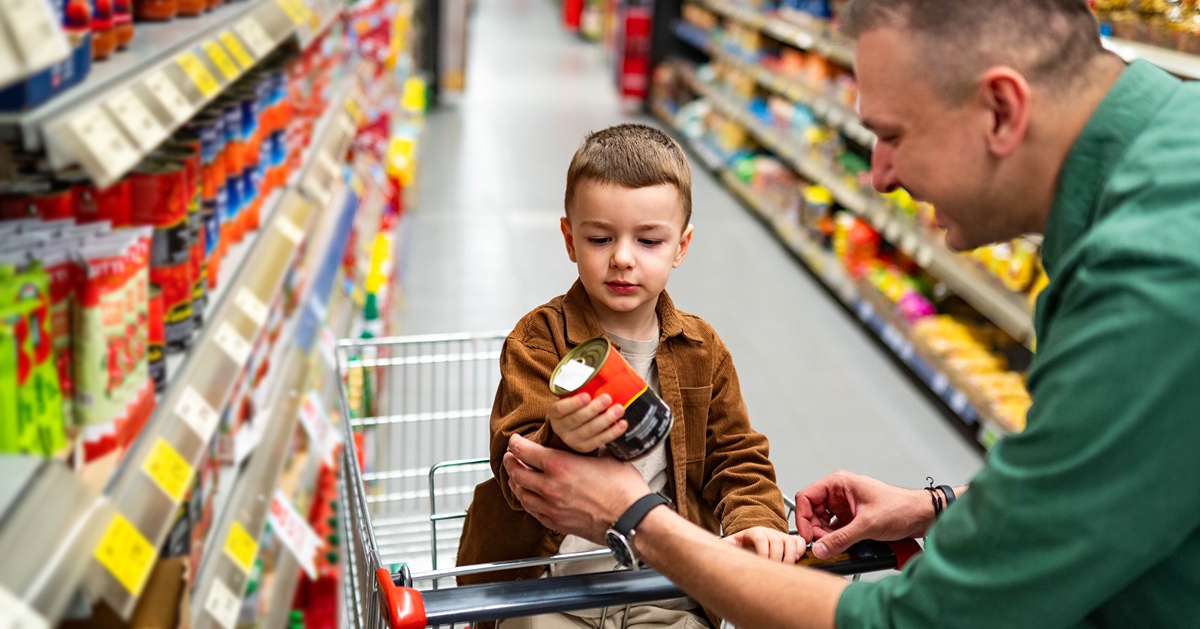 Dad and son shop at grocery store 