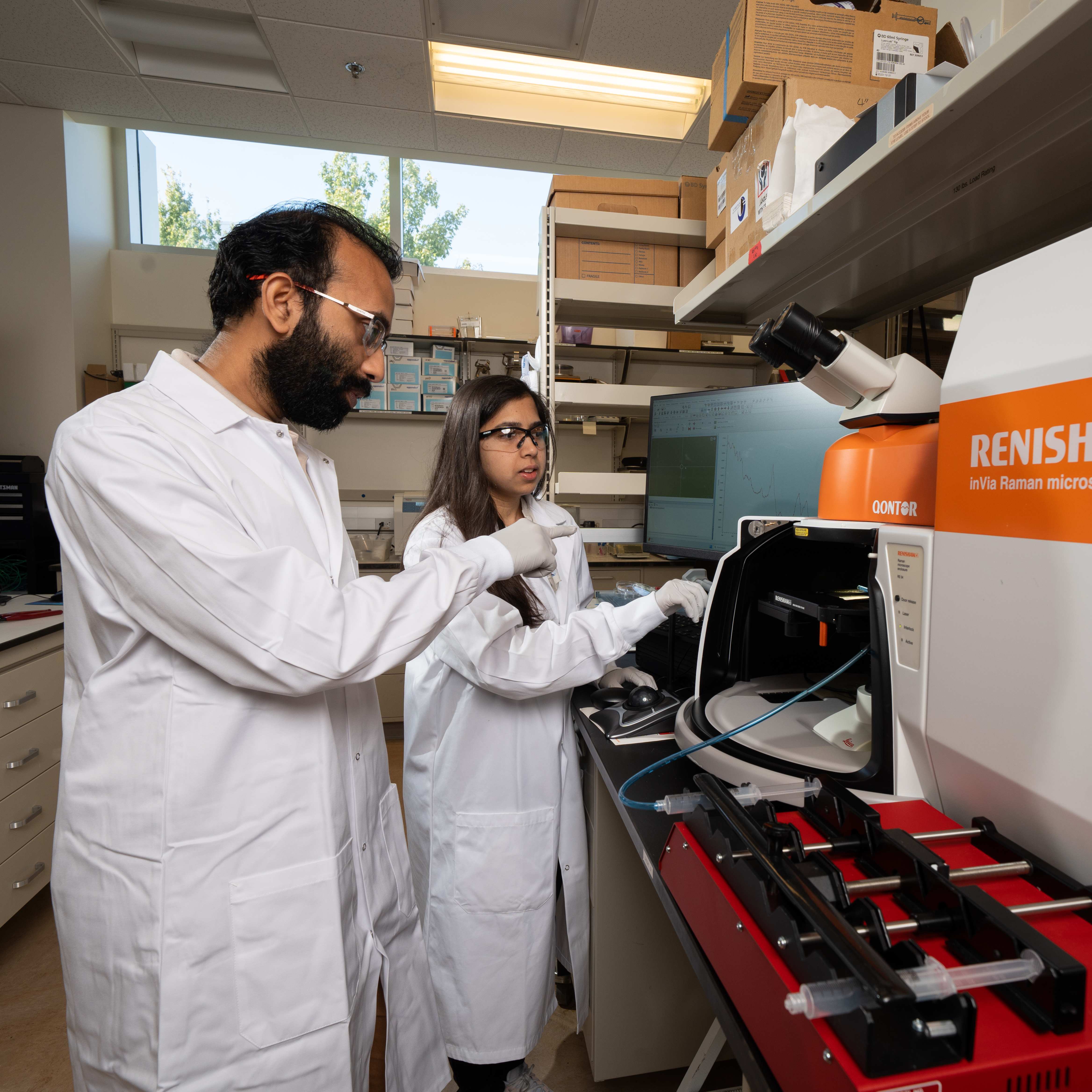 Researchers with a spectroscopy