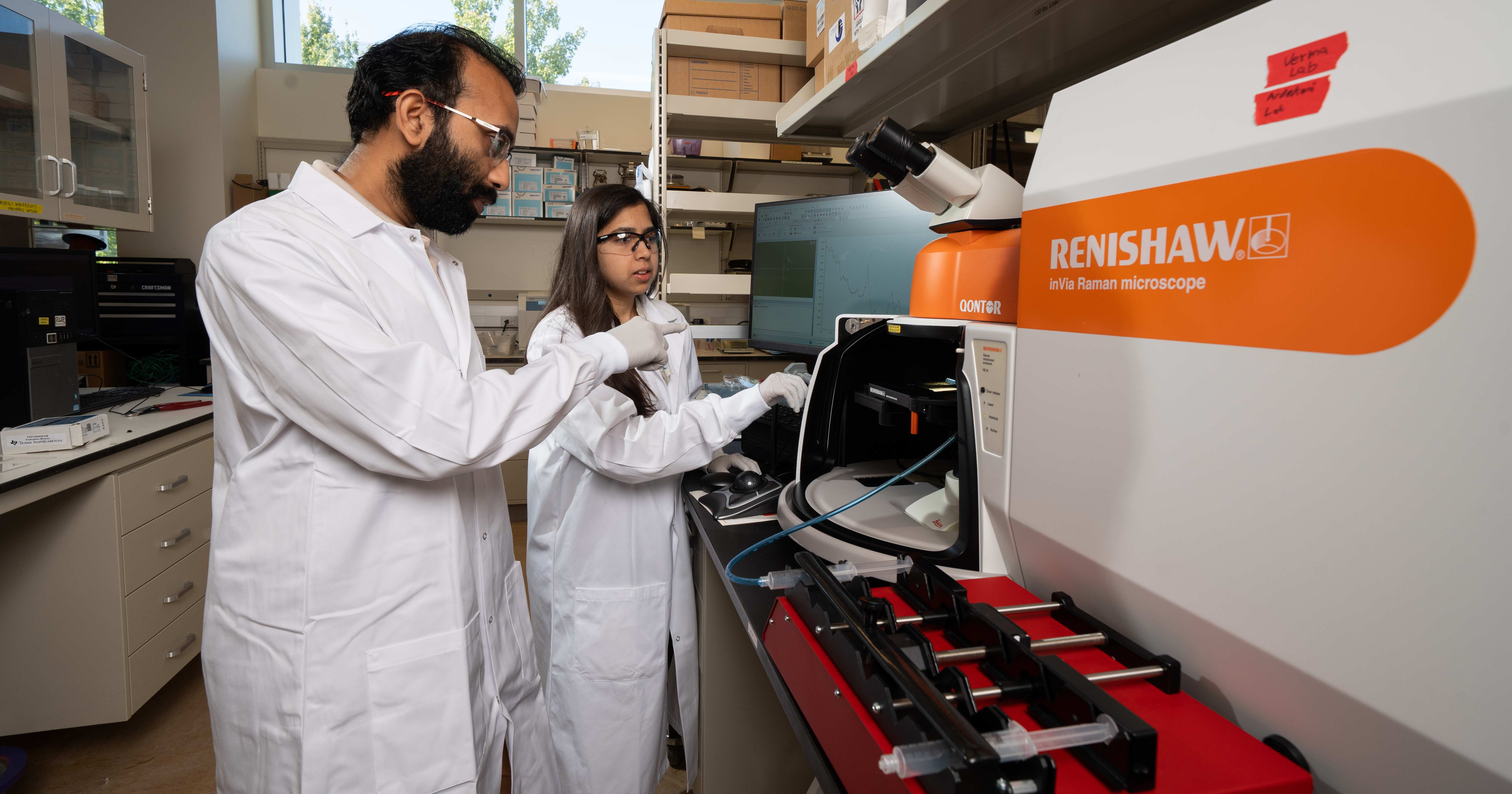 Researchers with a spectroscopy