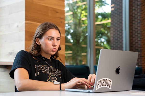 Meghan Haws works at her computer