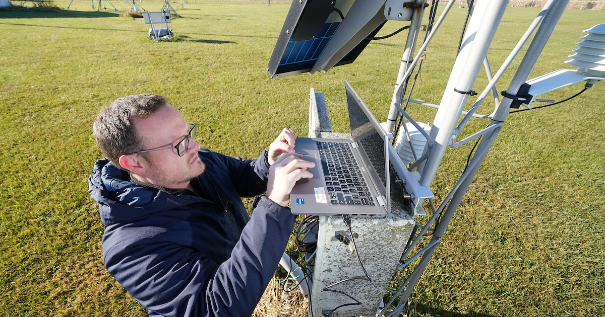 Austin Pearson servicing weather equipment.