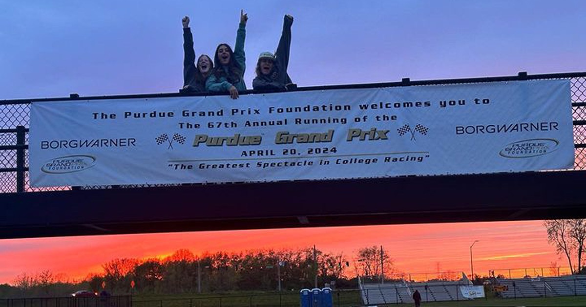 Bothwell poses with friends at Purdue Grand Prix