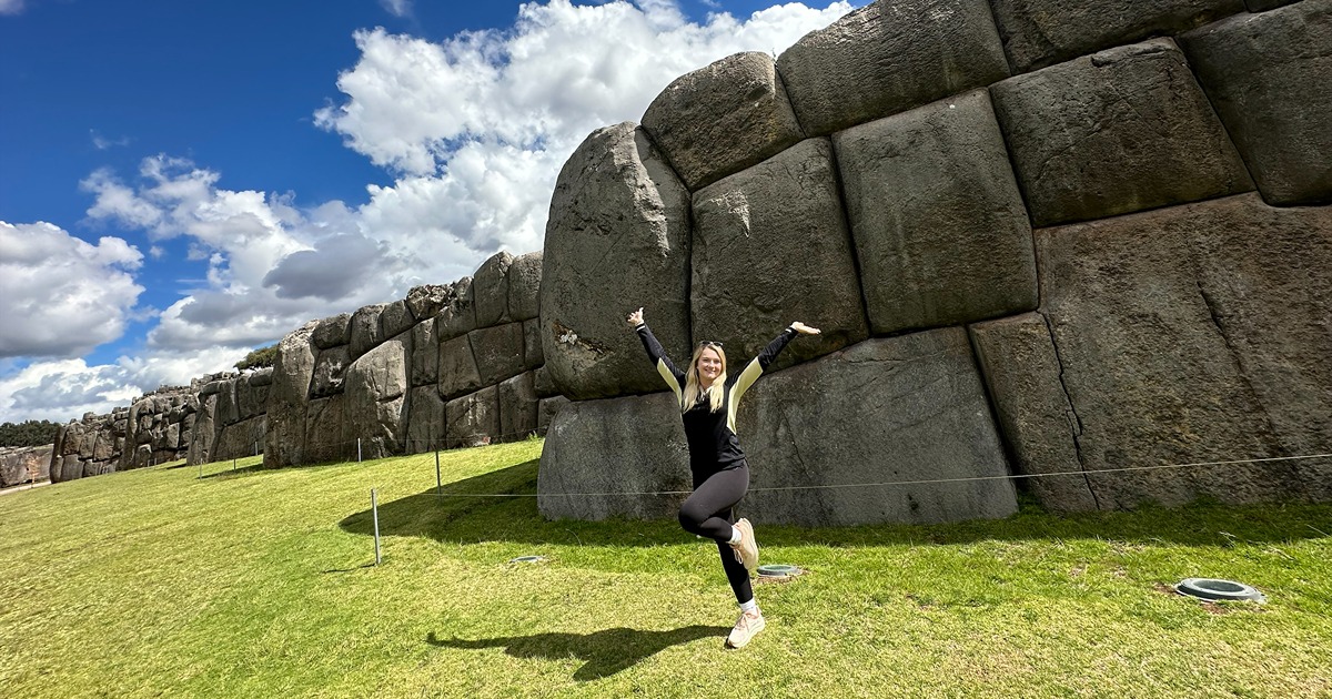 Meihls poses next to rocks in Peru