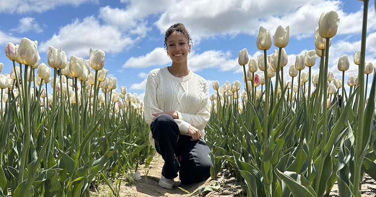 Sercu poses in tulip field