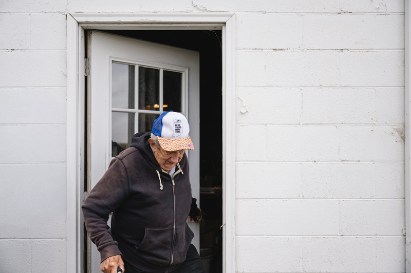 Bob Taylor closes a shed door. 