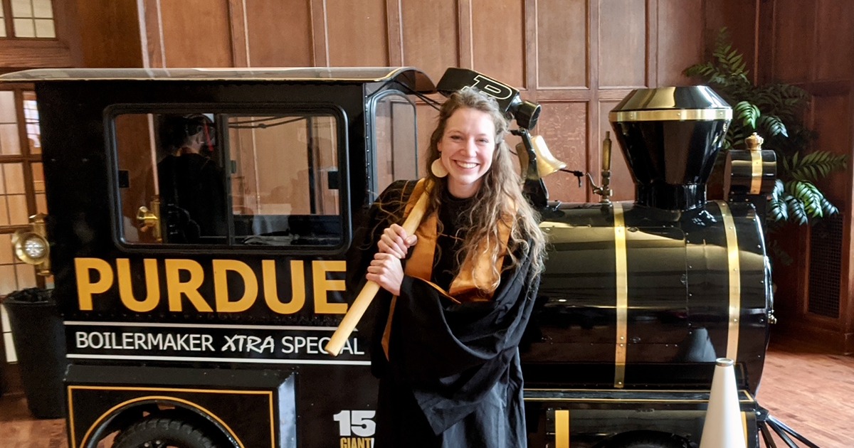 Student stands in front of Boilermaker Xtra special