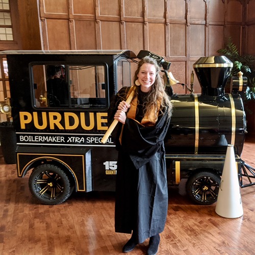 Student stands in front of Boilermaker Xtra special