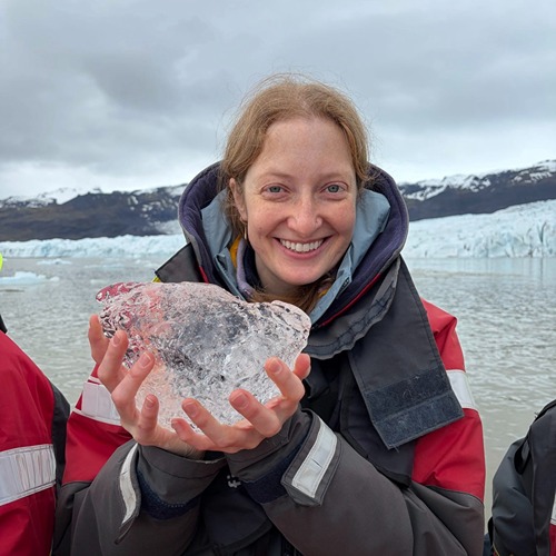 Shee holds block of ice