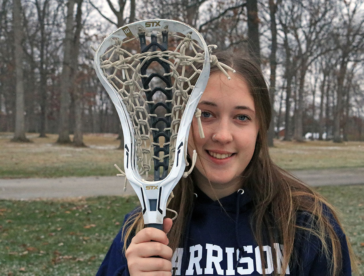 Isabel Lowry on a lacrosse field